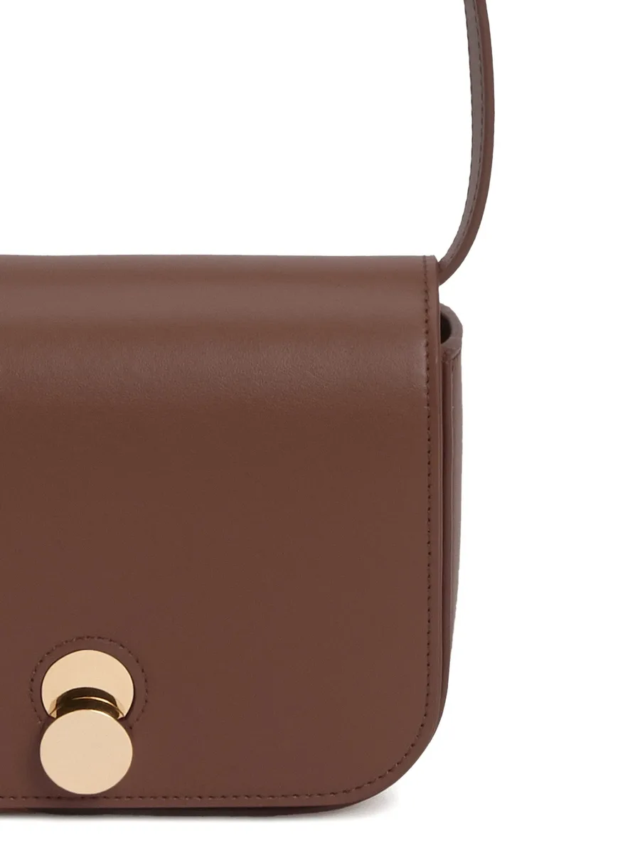 Eclissi curved-flap leather shoulder bag 10