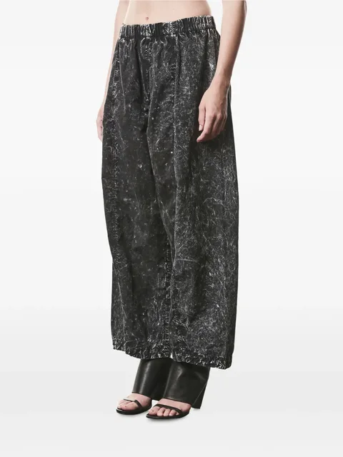 marble-print trousers
