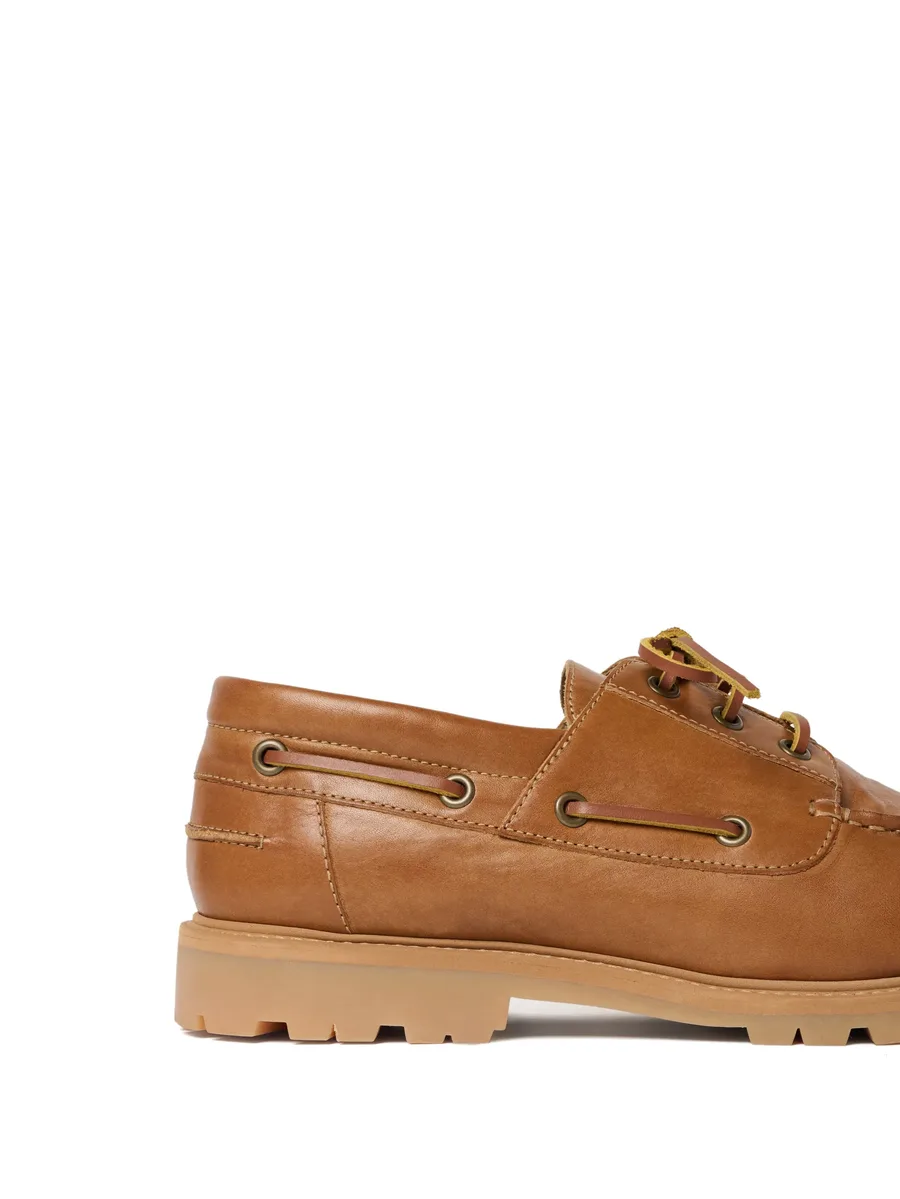 Guston raw-cut leather boat shoes 12