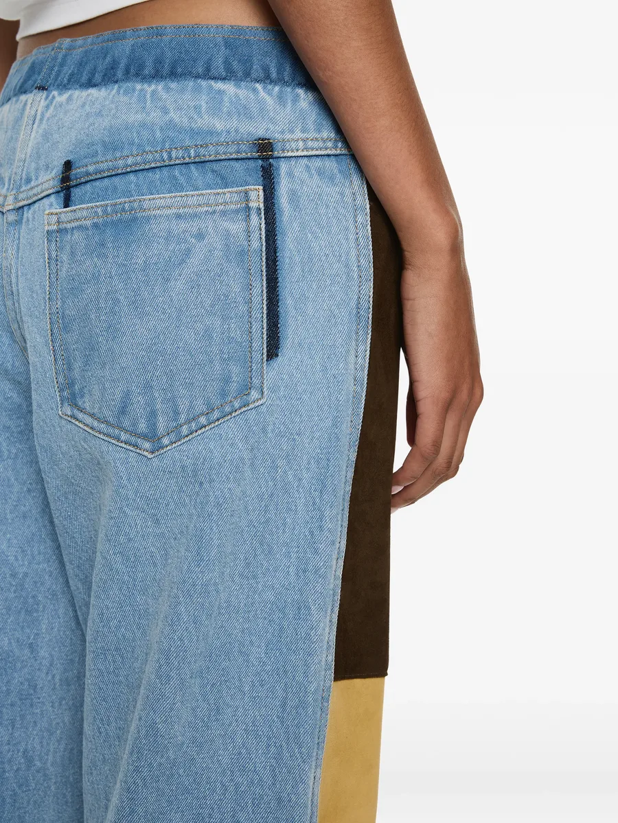 suede-panelled denim trousers 8
