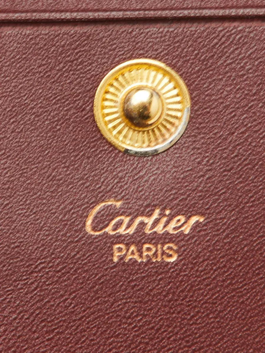 кошелек Le Must de Cartier с тисненым логотипом 6
