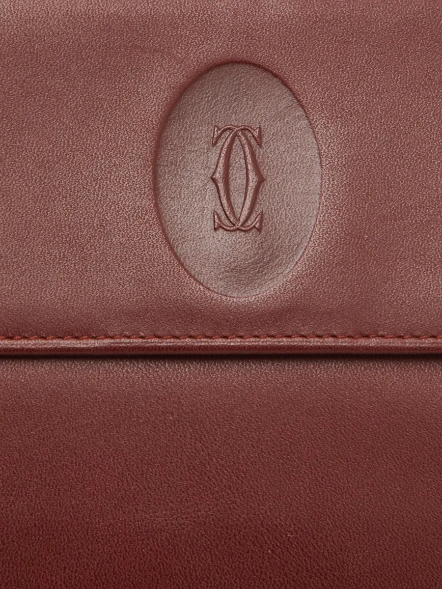 кошелек Le Must de Cartier с тисненым логотипом 10